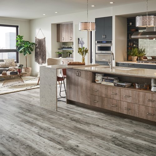 Modern Dining Room with gray laminate floor from BOOTH FLOORING INC in Tolland, CT