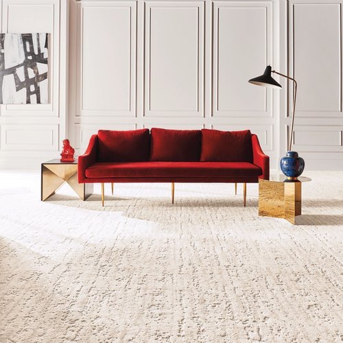 red sofa on a beige carpet floor from BOOTH FLOORING INC in Tolland, CT